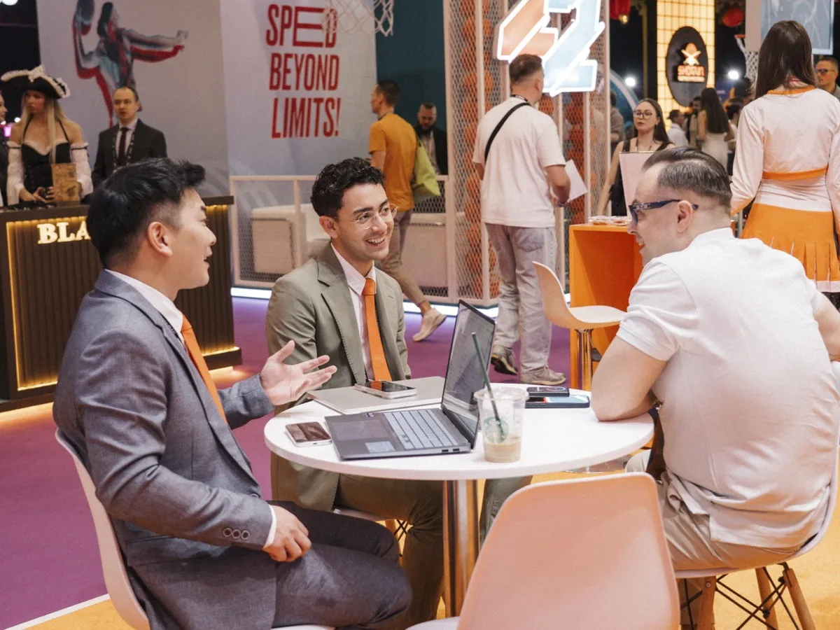 Delegates networking in the packed expo hall