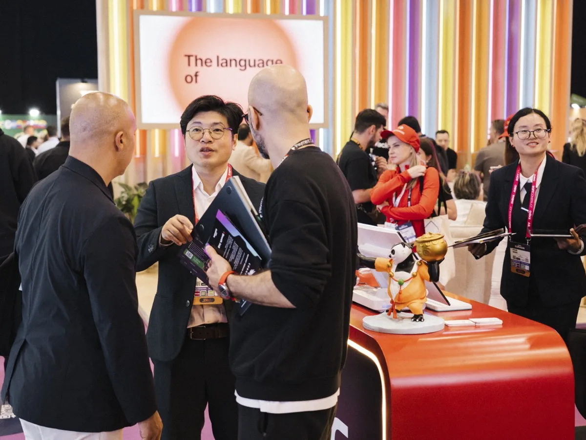 Exhibitor team welcoming visitors at their stand