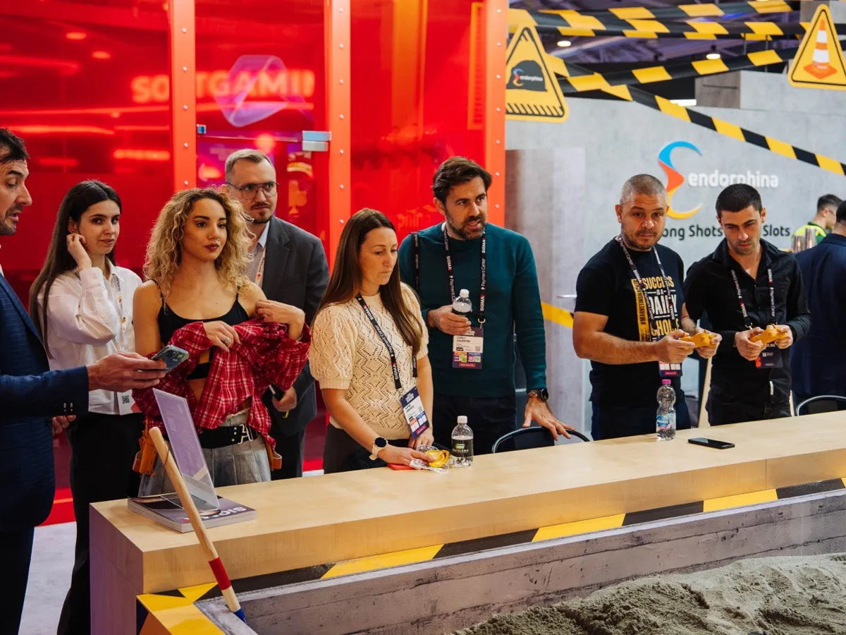 Attendees connecting with an exhibitor